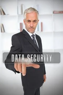 Businessman selecting the term data security Stock Photos
