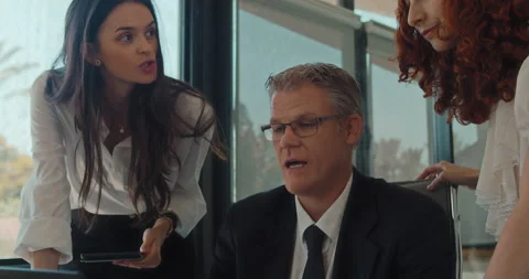 A businessman sharing his ideas about a project with the rest of the team Stock Footage 139921402