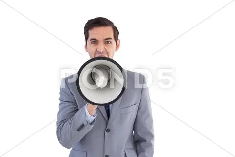 Businessman shouting into a megaphone Stock Photos