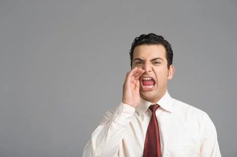 Businessman shouting Stock Photos
