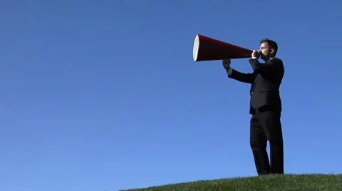 Businessman shouting through a megaphone Stock Footage
