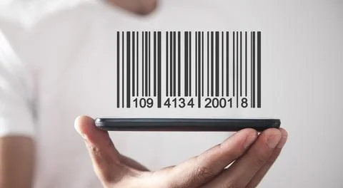 Businessman showing bar code. Warehouse, logistic and financial concept Stock-Fotos