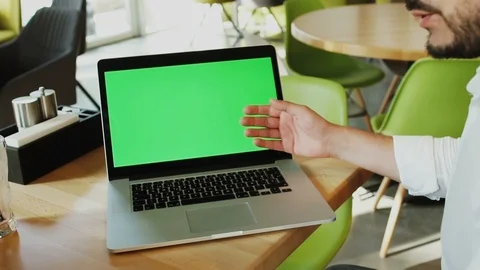 Businessman showing to the chroma key screen and handshake with colleague Stock Footage 112992753