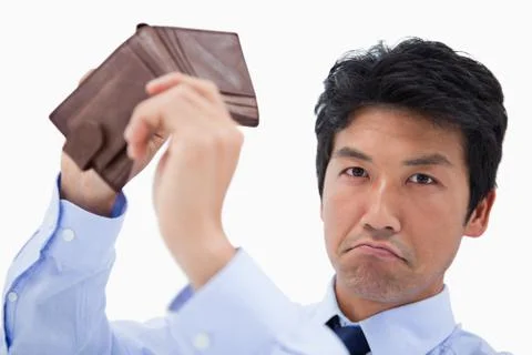 Businessman showing his empty wallet Stock Photos