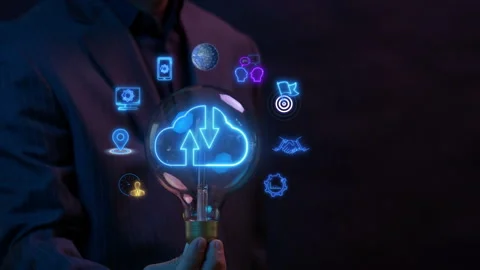 Businessman showing light bulb with cloud computing technology. Stock Footage 313372350