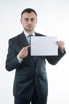 Businessman shows blank paper Stockfoto's