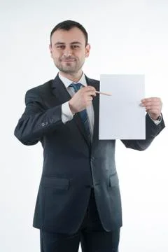 Businessman shows blank paper Stockfoto's
