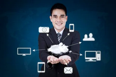 Businessman shows cloud computing icon Foto stock