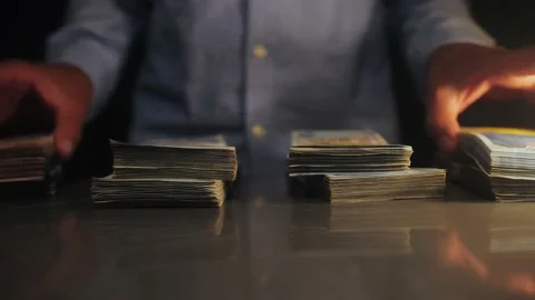 Businessman shows stack of dollars. Bills in the strap. Success man showing a Stock Footage 195116293