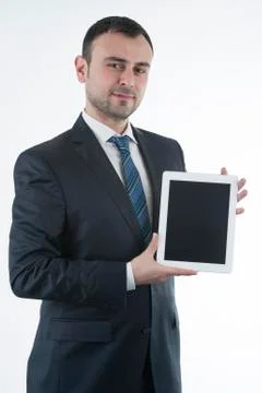 Businessman shows tablet Stock-Fotos