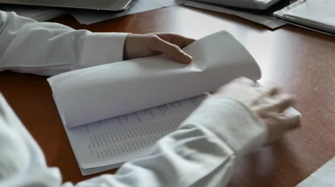 Businessman shuffles papers Stock Footage 61503685