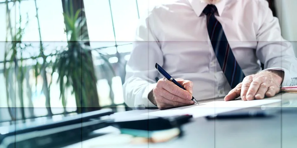Businessman signing a document, geometric pattern Stock Photos