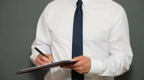 Businessman signing documents Stock Footage 57108665