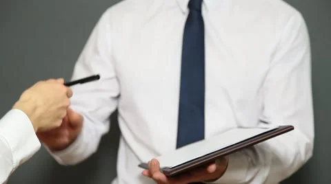 Businessman signing documents Stock Footage 57108829