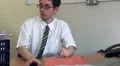 Businessman sitting at desk on phone HD Footage