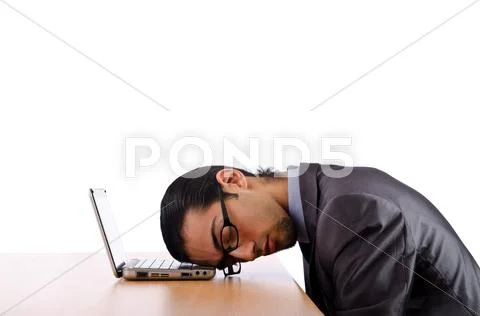 Businessman sitting at the desk Stock Photos