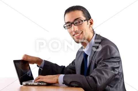 Businessman sitting at the desk Stock Photos
