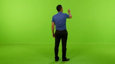 Businessman sliding virtual screen greenscreen back 4K Stockbeeldmateriaal 61955338