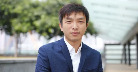 Businessman smile to camera Stock Footage 83613865