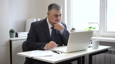 Businessman Solving Complex Problem at Work Stock Footage 275327552