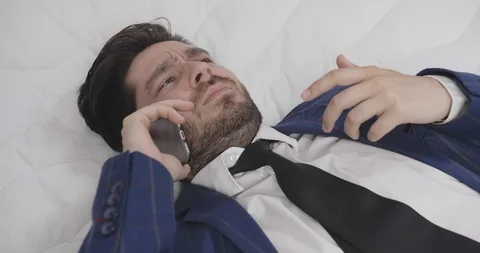 Businessman solving problem on phone Stock Footage 114374170