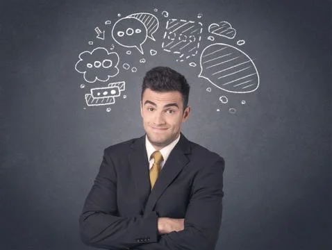 Businessman with speech bubbles Foto stock