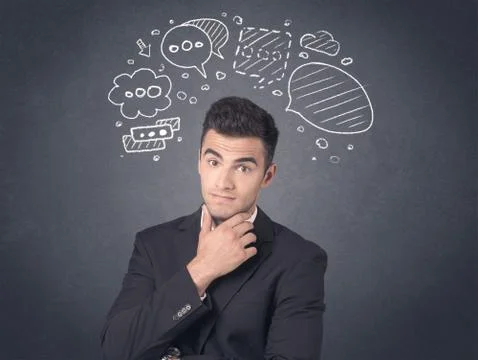 Businessman with speech bubbles Foto stock