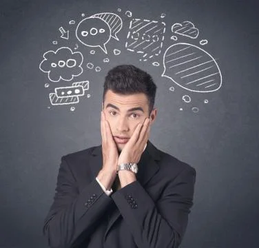 Businessman with speech bubbles Foto stock