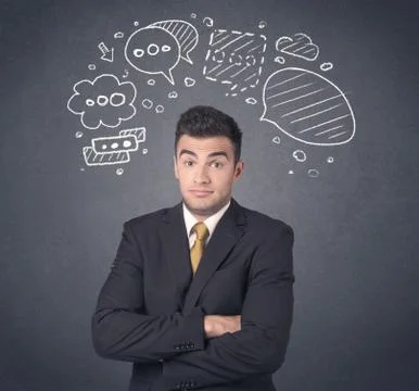 Businessman with speech bubbles Foto stock
