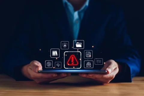 Businessman staff, programmer, developer using technology with triangle cauti Stock Photos