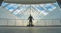 The businessman stand on the bridge in the business center Photo