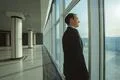 The businessman stand near panoramic window Photo