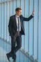 The businessman stand near the panoramic window Photo