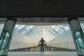 The businessman stand on the office hall Photo