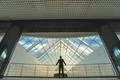 The businessman stand on the office hall Photo