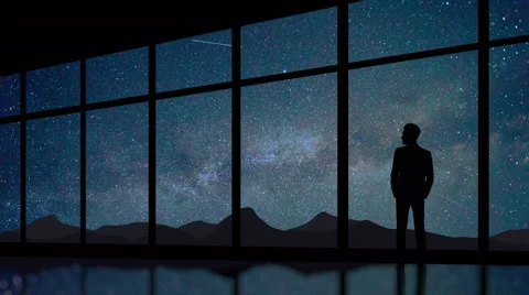 Businessman stand at the panoramic window on background starry sky.Time lapse 库存影片 68982529
