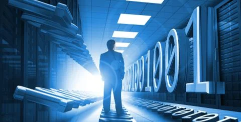 Businessman standing in data center with binary code Stock Photos