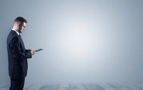 Businessman standing in an empty space Stock Photos