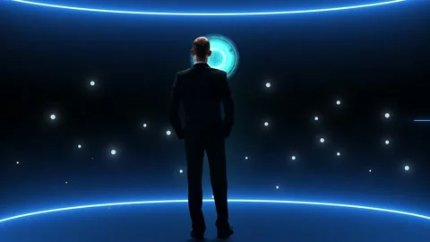 Businessman is standing in front of multi screen. Collage made of many different Stock Footage 219881735