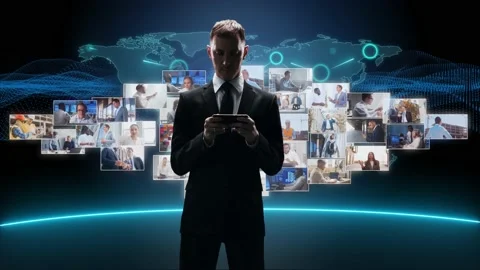 Businessman is standing in front of multi screen. Collage made of many different Stock Footage 220502115