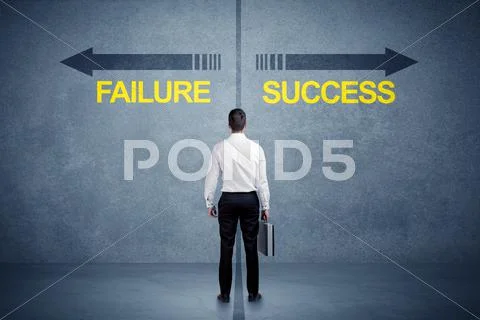 Businessman standing in front of success and failure arrow concept Stock Photos