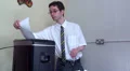 Businessman standing as he shredds HD Footage