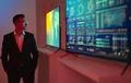 The businessman standing near screens with graphs Photo