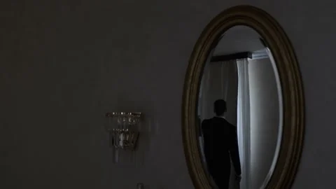 Businessman standing at the window Stock Footage 184435541