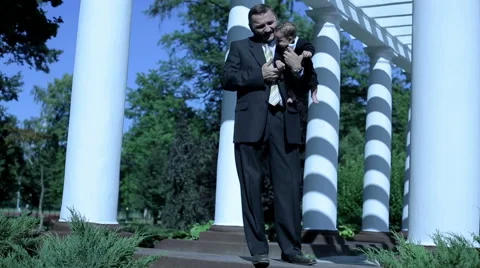 Businessman stands with his infants  Stock Footage 59088998