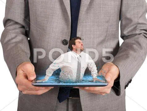 Businessman stressed and fatigued trapped by technology Stock Photos