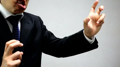 A businessman striking a fighting pose Stock Footage 335669166