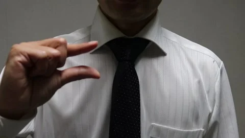 A businessman striking a slight pose. Stock Footage 335417810