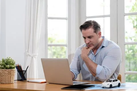 Businessman struggle to solve work problem from home. Synchronos 스톡 사진