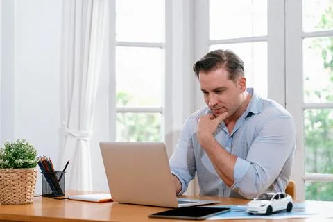 Businessman struggle to solve work problem from home. Synchronos 스톡 사진